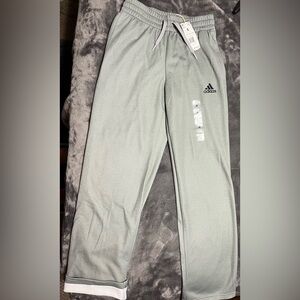 Men’s small adidas grey joggers. They have the softest inside. Never worn.